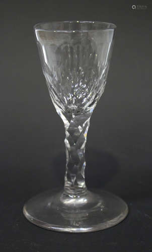 A diminutive faceted glass, late 18th century, the pointed funnel bowl with oblong and diamond