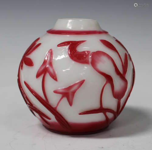 A Chinese Peking red on white overlay glass jar, probably late Qing dynasty, of globular form,