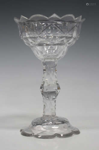 A sweetmeat glass, circa 1780, the ogee cut bowl with bevelled rim above a diamond faceted stem with