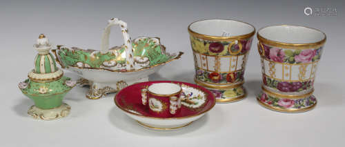 A pair of English porcelain cachepot and stands, early 19th century, each painted with floral