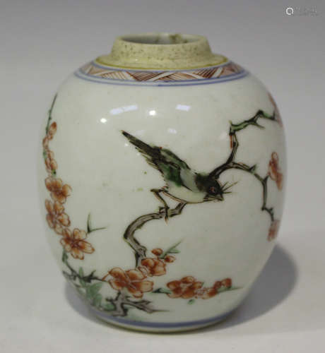 A Chinese famille verte porcelain tea canister, Kangxi period, of ovoid form, painted with a bird