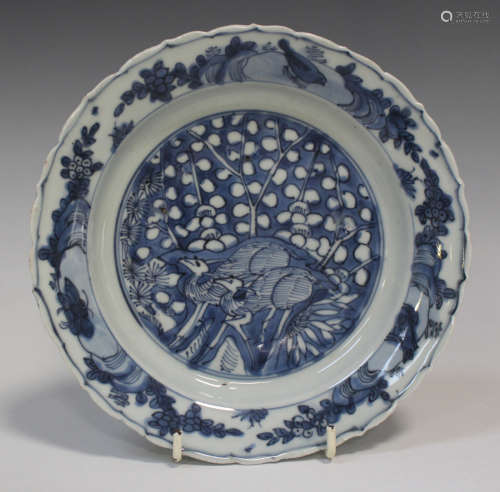 A Chinese blue and white Kraak porcelain plate, Wanli period, painted with two deer and prunus,