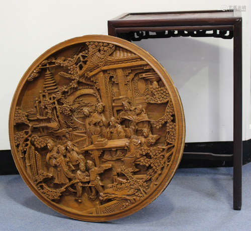 A Chinese hardwood side table, late 19th/early 20th century, with rectangular panelled top, height