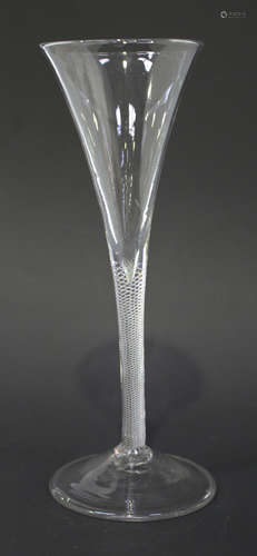 A wine flute or toasting glass, circa 1750, the drawn trumpet bowl raised on a plain multi series