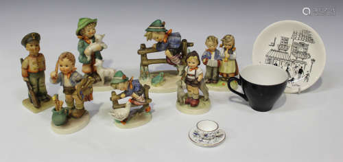 A group of decorative ceramics, including seven Goebel Hummel figures, a miniature Coalport cup