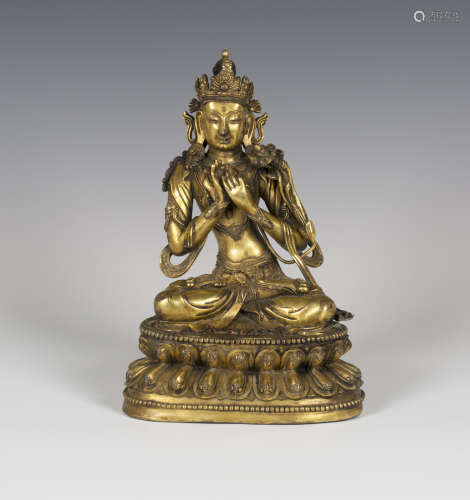 A Sino-Tibetan gilt bronze figure of Tara, probably 20th century, modelled seated in dhyanasana