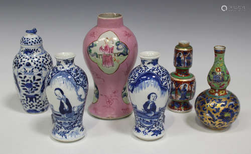 A group of six Chinese porcelain vases, Kangxi period and later, including a pair of blue and