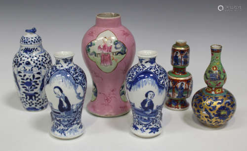 A group of six Chinese porcelain vases, Kangxi period and later, including a pair of blue and