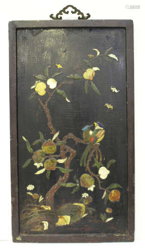 A Chinese inlaid lacquer rectangular panel, Kangxi period, inlaid with vari-coloured hardstones