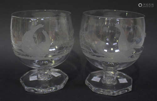 A set of four cockfighting glasses, late 19th/early 20th century, each large rounded bowl engraved