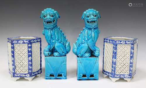 A pair of Chinese turquoise glazed Buddhistic lions, 20th century, typically modelled raised on