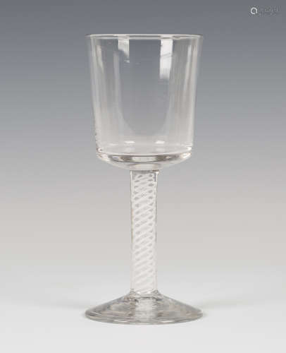 A double series opaque twist stem goblet wine, circa 1770, the large bucket bowl raised on a plain