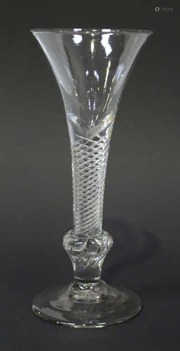 A composite stem wine glass, circa 1750, the trumpet bowl above a multi series airtwist stem with