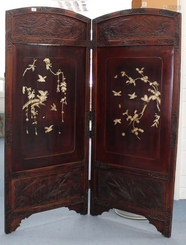 A Japanese inlaid lacquer two-fold screen, Meiji period, each panel inlaid in bone with birds and