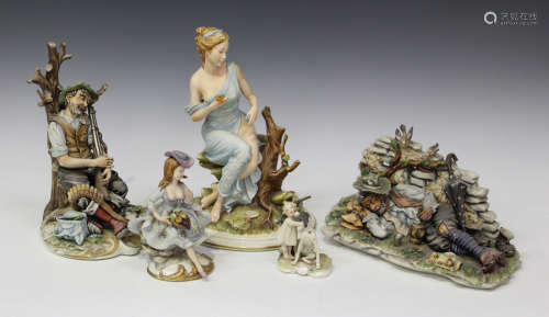 A collection of mostly Capodimonte porcelain figures, 20th century, including a seated classical