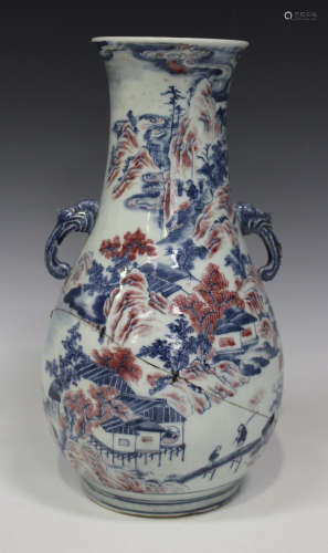 A Chinese underglaze blue and red porcelain vase, late Qing dynasty, of pear-shaped form, painted