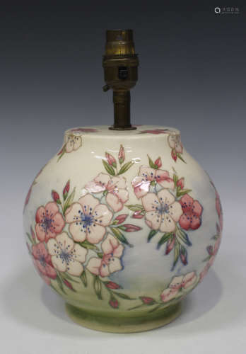 A Moorcroft pottery table lamp base, circa 1990, designed by Sally Tuffin, the spherical body
