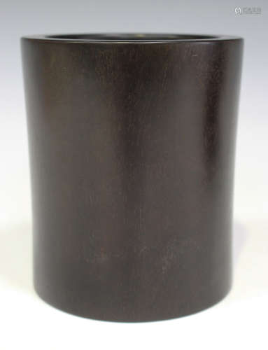 A Chinese hardwood brushpot of slightly waisted cylindrical form, height 14cm.Buyer’s Premium 29.
