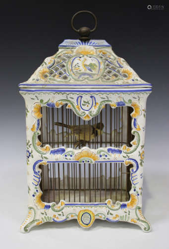 A French faience decorative birdcage and domed cover, circa 1900, of rectangular scroll moulded form
