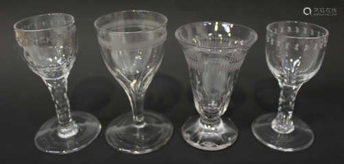 A faceted stem wine glass, late 18th century, the rounded bowl with oval facet and engraved detail