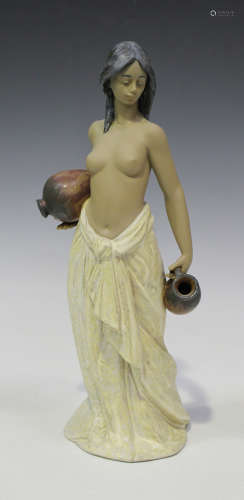 A Lladro porcelain figure 'Water Girl', No. 2323, boxed with certificate.Buyer’s Premium 29.4% (