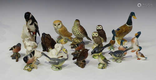 A large group of animal models, including twelve Beswick birds, five Beswick mallards, a Goebel