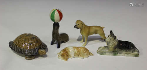 A rare Wade seal corkscrew, a Wade tortoise and cover and three Branksome dogs.Buyer’s Premium 29.4%