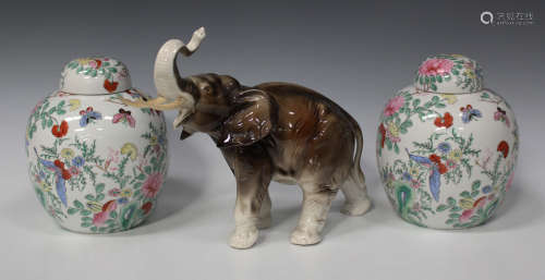 A Royal Dux porcelain model of an elephant, 20th century, with applied triangular tablet mark,