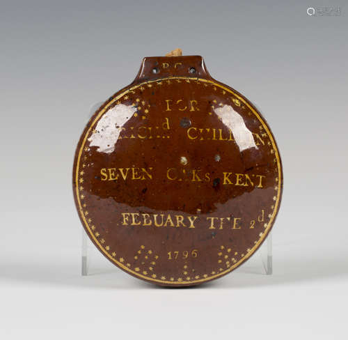 A Kent slipware pottery harvest flask, dated 1796, of flattened circular form, the front yellow slip