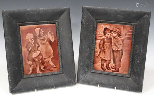 A pair of tiles, possibly Sherwin & Cotton, early 20th century, each decorated with two children and