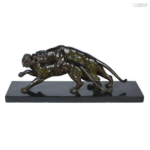 SIGNED IN CAST, CIRCA 1925  a large art deco patinated bronze group depicting fighting panthers by S.Melani