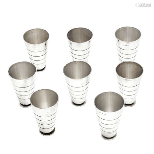 MARK OF GEORG JENSEN, COPENHAGEN, 1925-1932 A Set of Eight Danish Silver Beakers, designed by Sigvard Bernadotte (1907-2002)