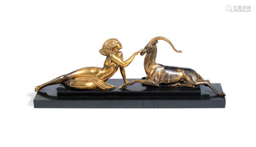 SIGNED IN CAST 'FAYRAL'; 20TH CENTURY 'Seduction' an art deco gilded art metal study by pierre le faguays (fayral)