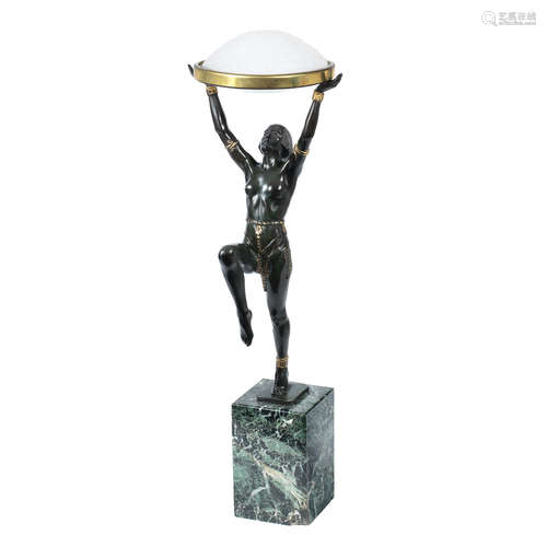 SIGNED IN CAST, TWENTIETH CENTURY 'danseuse a la coupe' an art deco patinated spelter figural lamp with moulded glass shades by max le verrier