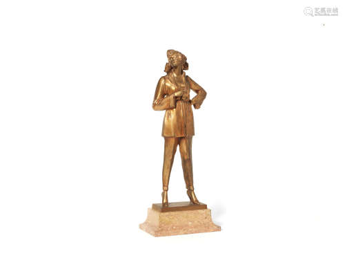SIGNED IN CAST, CIRCA 1925 'the cigarette girl' an art deco gilded bronze study by bruno zach