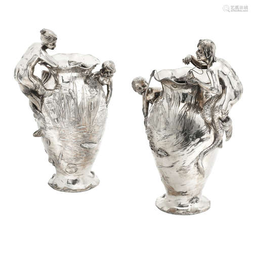 STAMPED MAKER'S MARKS, CIRCA 1900  a pair of WMF plated pewter figural vases with children and merfolk