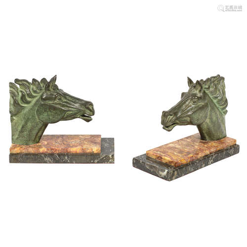 SIGNED TO BASE, CIRCA 1925 a pair of art deco patinated bronze horse head bookends by R. Peyre