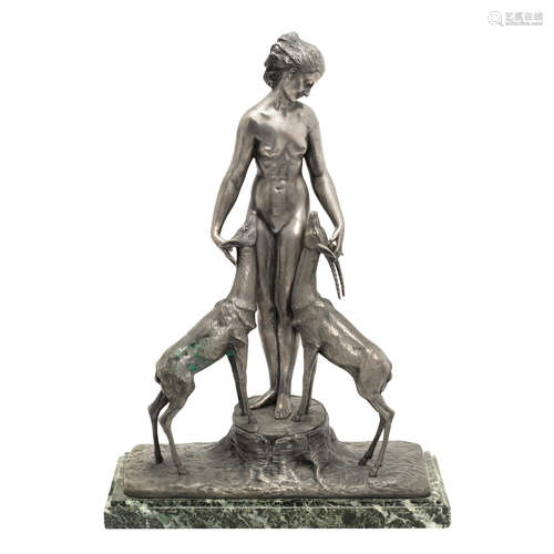 SIGNED IN CAST, CIRCA 1925 'Diana with stag and hind' an art deco silvered bronze study by marcel bouraine