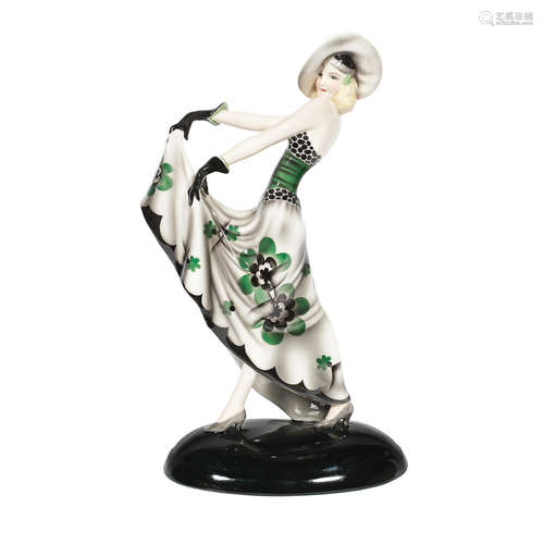 MAKER'S MARKS, CIRCA 1925 A Goldscheider art deco ceramic model of a stylish lady in floral dress by dakon