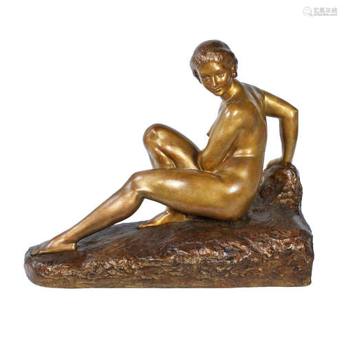 SIGNED IN CAST, CIRCA 1925 a large art deco patinated bronze study of a seated female nude by Marcel Bouraine