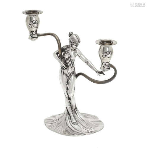 STAMPED MAKER'S MARKS, CIRCA 1900 a WMF figural plated pewter art nouveau twin-branch candlestick