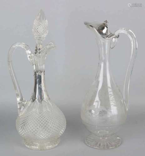 Crystal wine jug and decanter with silver, 835/000. Wine jug with etched representation, on round