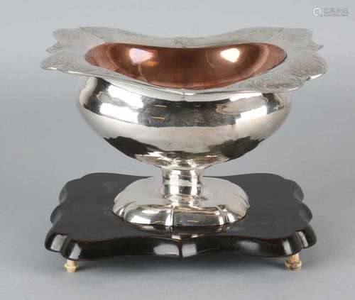 Silver pipe combination, 833/000, with red copper insert on black base resting on 4 ivory legs, with