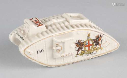 Stoke on Trent porcelain salt spreader in the shape of a British tank, model WO I. Size: 5 x 13 x