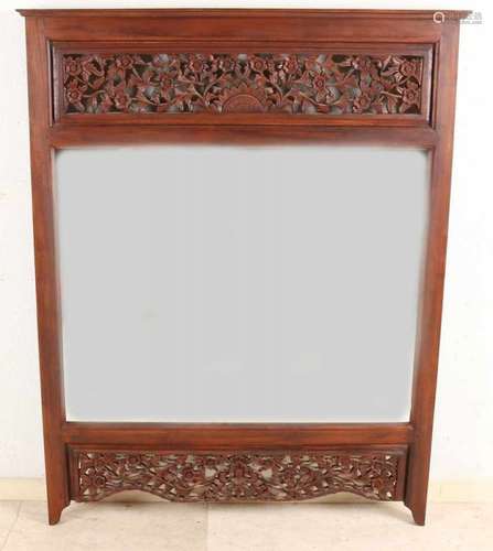 Indonesian wood-stained mirror with floral decors. Second half of the 20th century. Size: 113 x 88