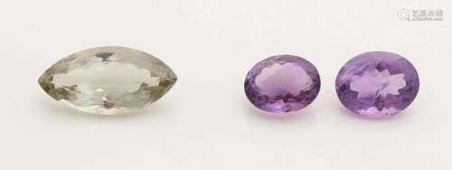 Fate with three amethysts, a marquis cut with greenish color, approximately 17.45 ct, with small