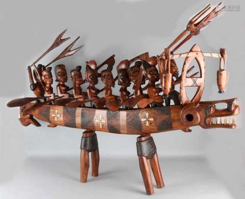 Large African tropical wooden boat with male and female figures, with accessories. Size: 103 x 130 x