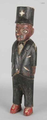 Antique African or South American woodcarved polychrome policeman. First half of 20th century. Size: