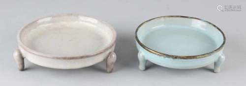 Two old Chinese porcelain water bowls with crackle glaze. One marked and with text on the bottom.