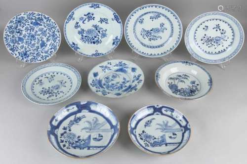Nine times 18th century Chinese porcelain plates, diverse. One garden decor, blue / white, chip. Two
